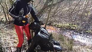 Rich German femdom in latex dominates outdoors brutally.