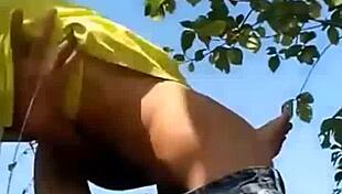 A petite Asian beauty gets naughty outdoors with her man in homemade video
