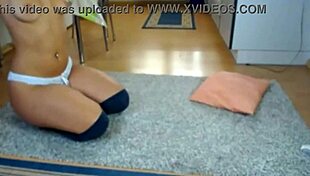 Watch her finger herself wildly on webcam!