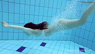 Roxalana Cheh Sexy Redhead Underwater.