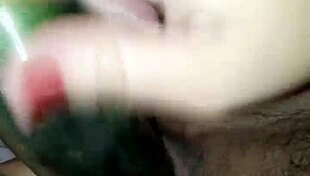 Claudia And Her Cucumber In A Simple Scene.