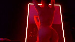 woman in torn leggings uses vibrator for masturbation