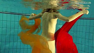 I watch Nastya strip naked and reveal her tight pussy in the pool