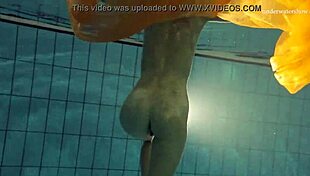 I watch Nastya strip naked and reveal her tight pussy in the pool