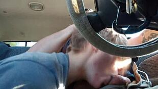 Driving down the road, he gets a blowjob from a guy with socks on his black cock