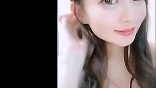 japanese woman dances sexily with big boobs