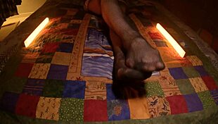 Perfect feet peek through fishnet pantyhose