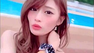 japanese woman dances sexily with big boobs