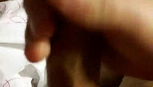 the amateur guy masturbates his big cock in front of the camera