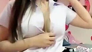 Watch this Khmer student strip down? She's so eager to show off her body.