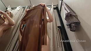 Wow! Mischievous girl strips naked in crowded store fitting room