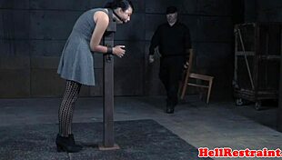 restrained submissive is whipped by male dominant in bondage session with toys and anal play