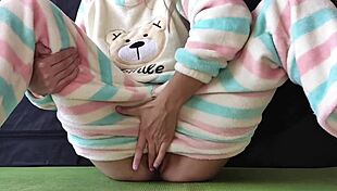 does this teen in pajamas masturbate her pussy hard?