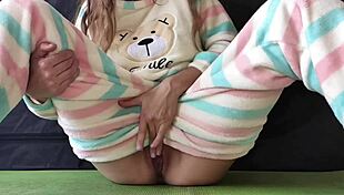 does this teen in pajamas masturbate her pussy hard?