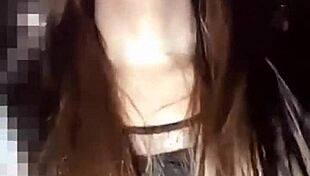 Asian ladyboy exposes ass in crossdressing video