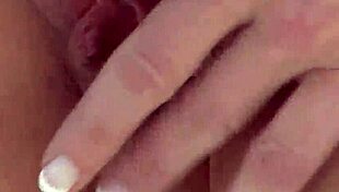 Randy moore lounges outdoors in a bikini, playfully teasing her tits in solo fun.