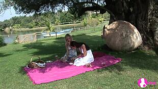 Blonde and Brunette Babes Have Sex in the Garden