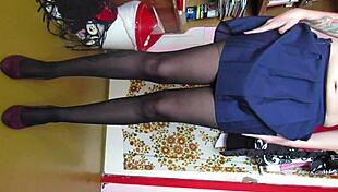Leg fetish model teases in skirt and stockings for custom video