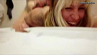 The tattooed blonde swallowed the cock whole and screamed as he thrust deep.