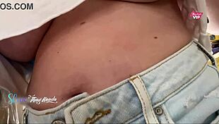 Hot wife flashes big natural tits to seller while shopping outdoors.