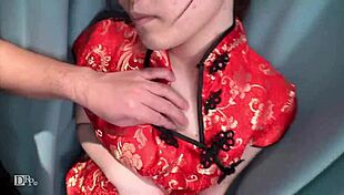 Asian girl gives blowjob in photo session.