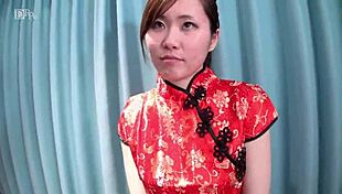 Asian girl gives blowjob in photo session.