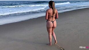 Blonde girl fucked doggystyle on beach.