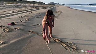 Blonde girl fucked doggystyle on beach.