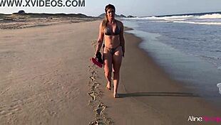 Blonde girl fucked doggystyle on beach.