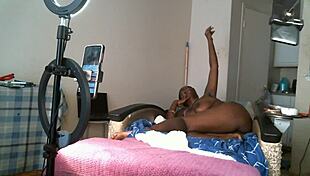 solo african american milf strips naked and plays with her saggy tits and big boobs