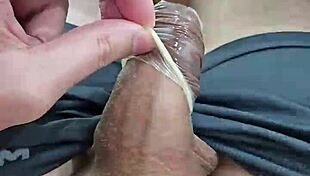 Slow motion removal of condom in homemade video with cute neighbors.