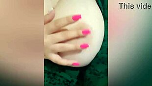 young beauty plays with her breasts