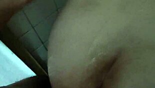 Watch my horny stepmother bathing in the shower!