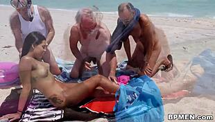 Nikki Kay With Older Gentlemen In Group Setting