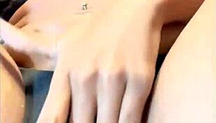 In lingerie, she masturbates her natural tits and pussy, cumming four times.