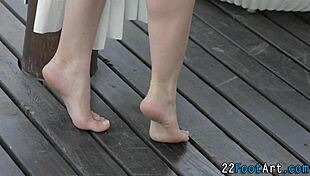 Beauty Feels Intense Pleasure Giving Footjob Outdoors