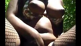 Masked girl masturbates outdoor