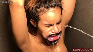 Transsexual Winnie Deepthroats Cock in Pissing Scene