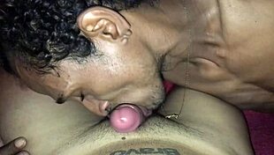 In a hotel room, a black guy with a 22cm cock gives a passionate blowjob