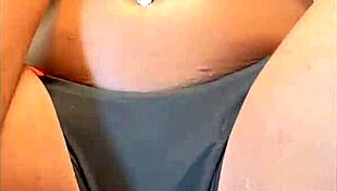 In lingerie, she masturbates her natural tits and pussy, cumming four times.