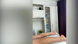 Sugarnadya waxes her client's slender legs in foot fetish close-up.