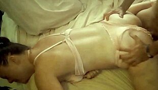 Sexy black milf in satin dress gets fucked doggystyle, sucks cock, and licks pussy with dirty talk