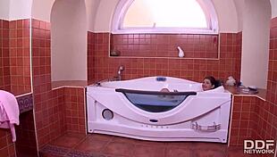 Russian teen with natural glamour poses in bathroom setting