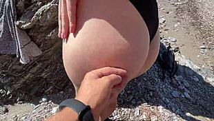 hot brunette passionately fucks stranger sloppy on public beach