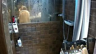 hidden cam catches two girlfriends naked in bathroom shower