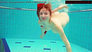 Hot ginger Polish girl goes topless in the pool