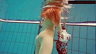 Hot ginger Polish girl goes topless in the pool