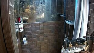 hidden cam catches two girlfriends naked in bathroom shower