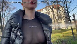 Beautiful blonde flashes natural big tits in public park