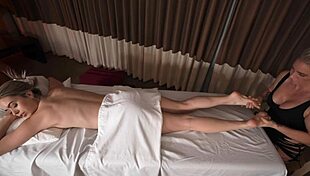 Blonde bodybuilder milf Jill Kassidy licks Talulah Mae's big tits during lesbian muff diving.